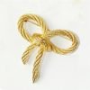 51SiCZjq7nL._AC_SL1003 Elegant Gold Color Bow Tie Brooch Lapel Pin For Women Simple Dress Coat Cardigan Wedding Jewelry Gifts